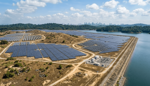 Solar panels installed near a river or reservoir illustrating low water consumption in clean energy generation