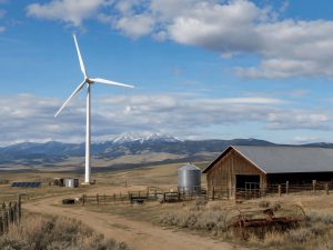 Wind energy supporting farm irrigation with water pumping equipment and crop fields